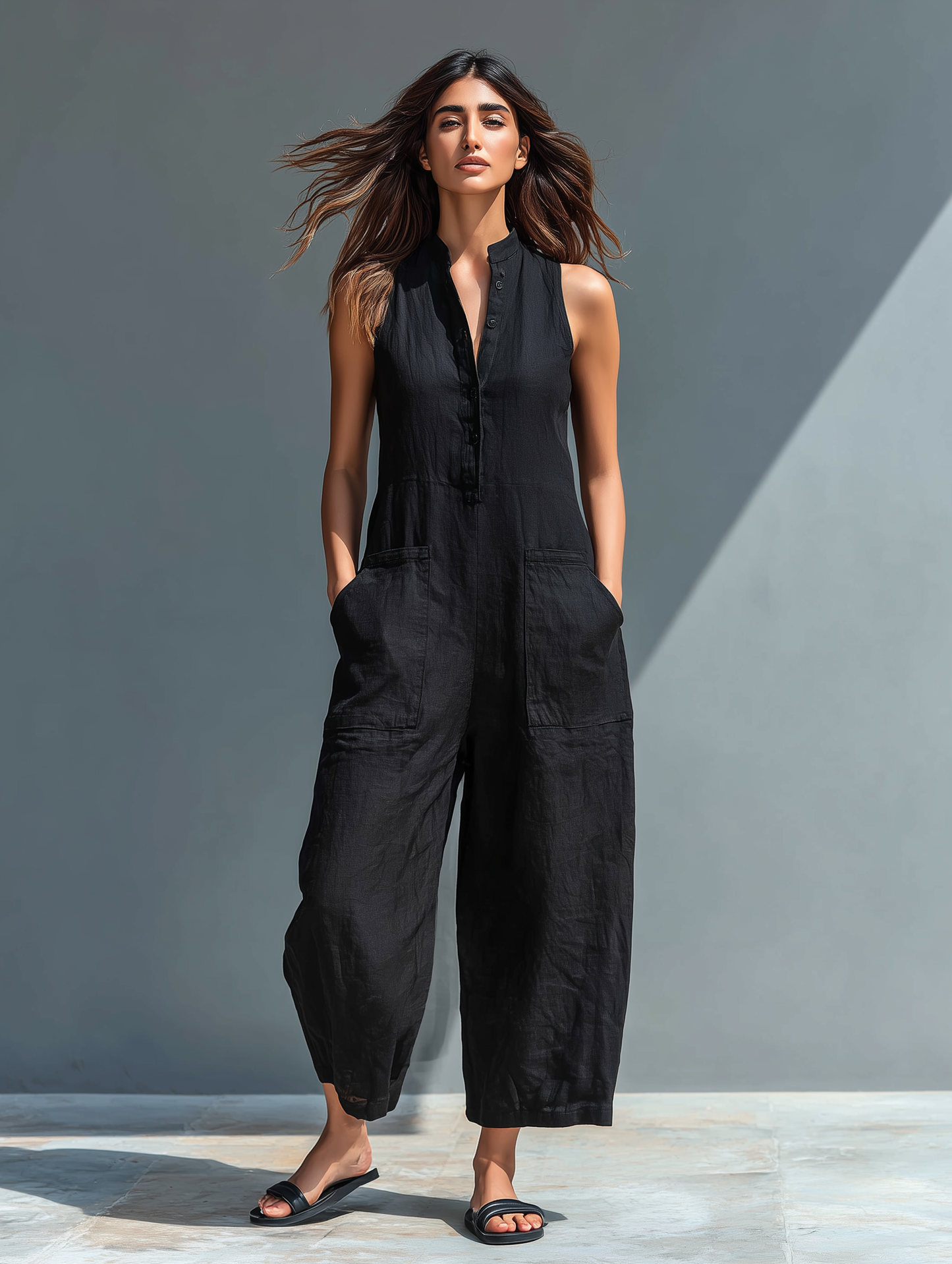 Ermeløs Minimalistisk Jumpsuit for Kvinner med Høy Krage og Knapper