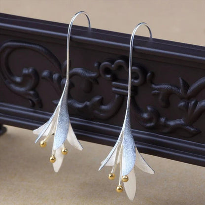 Elegante sølvblomsterøreringer