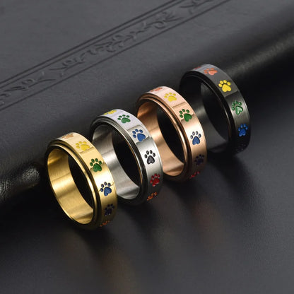 Roterende antistressring med pote-motiv