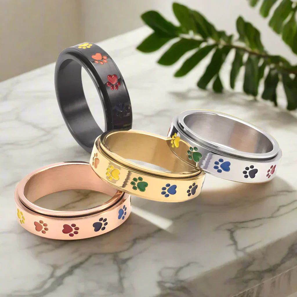 Roterende antistressring med pote-motiv