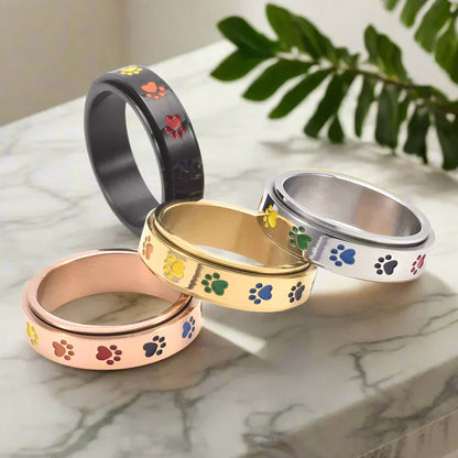 Roterende antistressring med pote-motiv